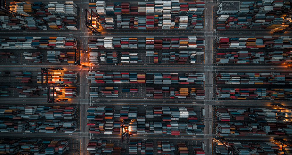 overhead view of multi-colored shipping containers - Sustainable Logistics Practice